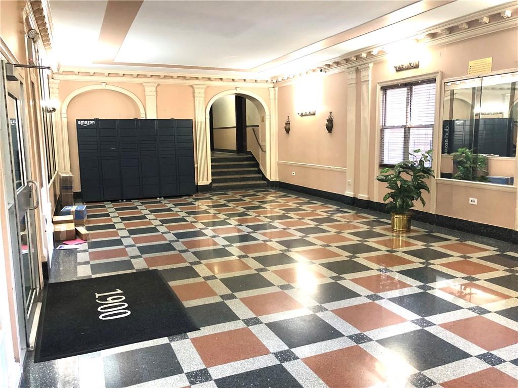 1900 Quentin Road, Unit E5 Brooklyn, NY 11229 - Photo 2 of 17 a view of a livingroom with wooden floor and furniture