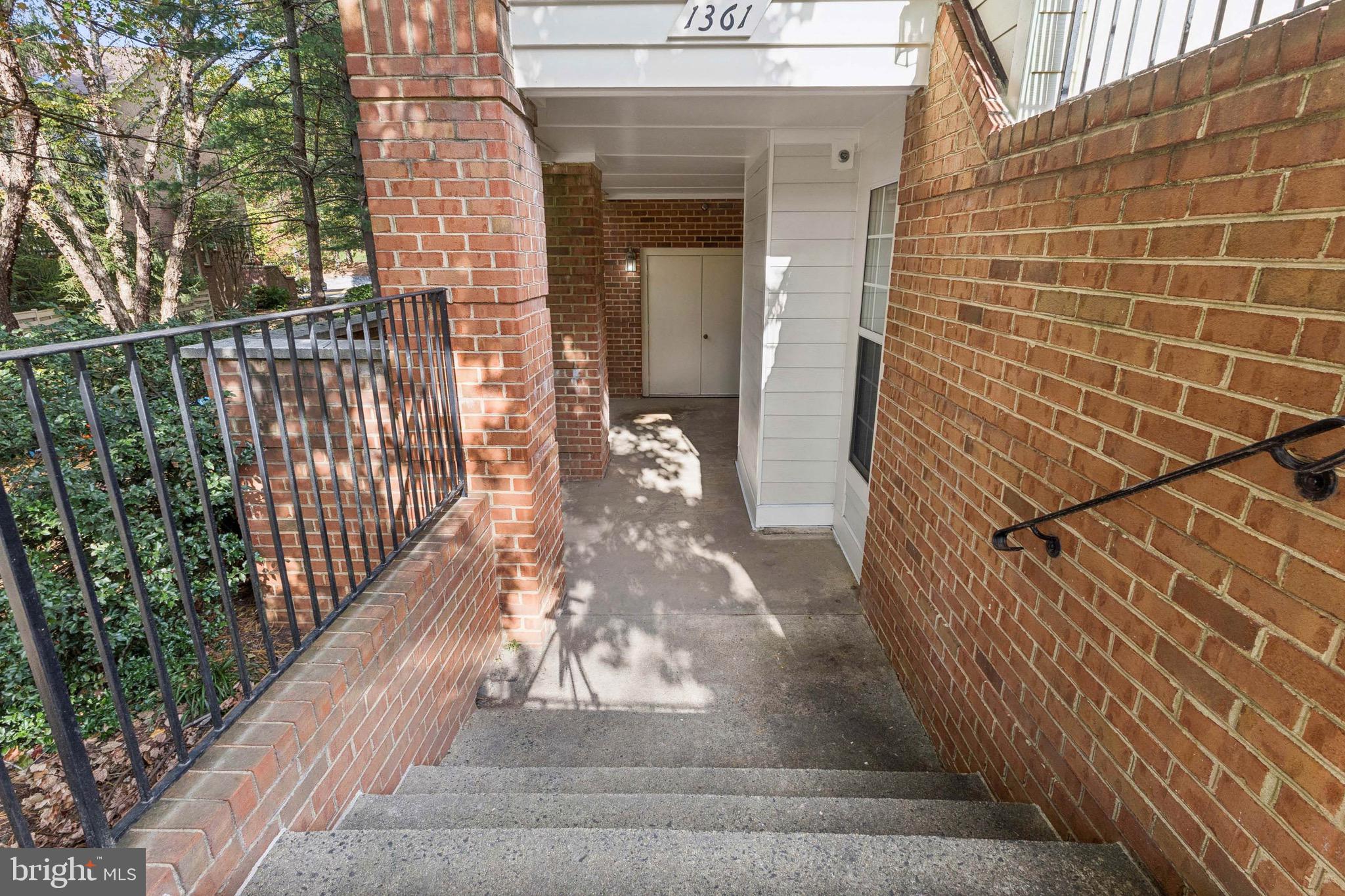 1361 Garden Wall Circle, Unit 701 Reston, VA 20194 - Photo 2 of 15 a view of a porch