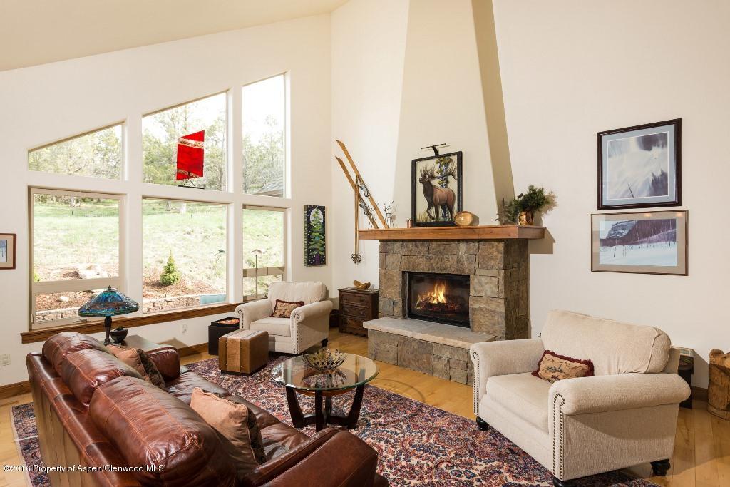 370 Faas Ranch Road New Castle, CO 81647 - Photo 5 of 19 fireplace and windows