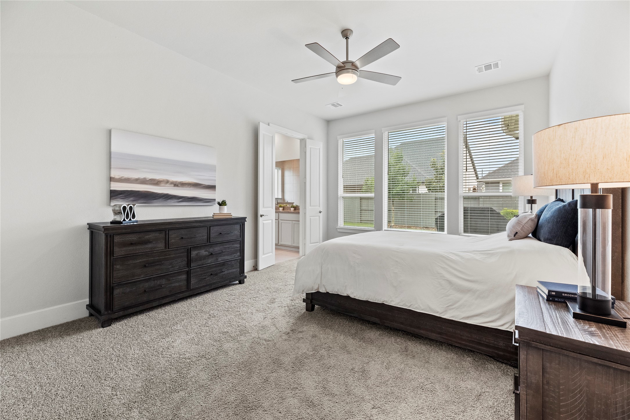 5535 Water Terrace Lane Fulshear, TX 77441 - Photo 22 of 43 a bed room with a bed and a window