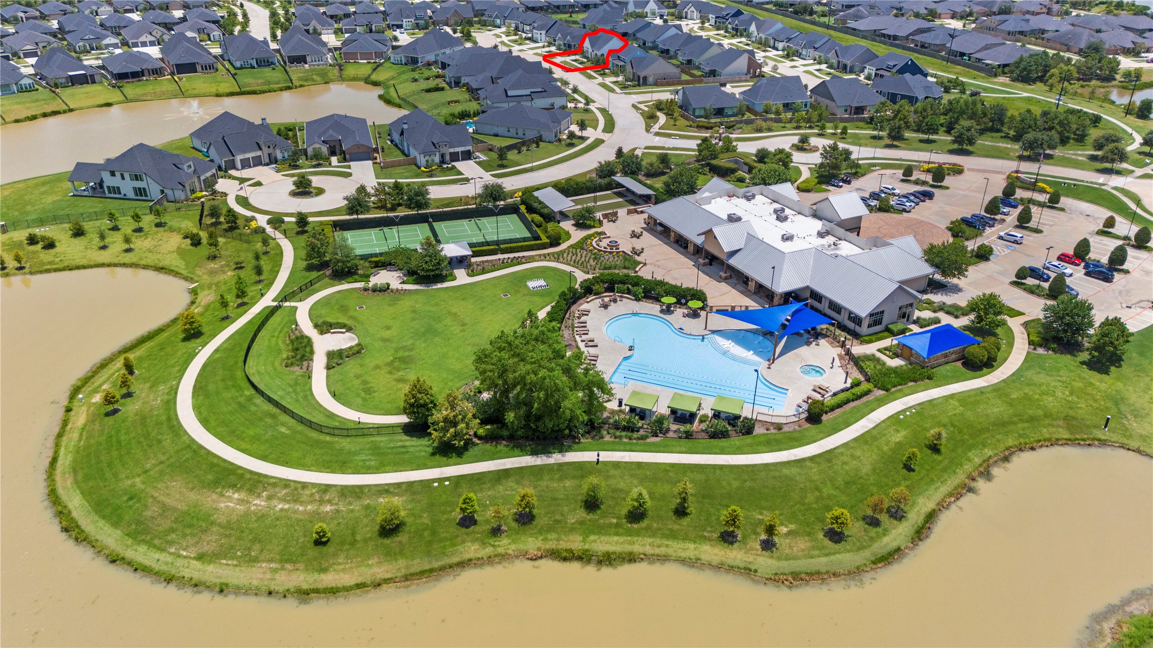 5535 Water Terrace Lane Fulshear, TX 77441 - Photo 36 of 43 an aerial view of a swimming pool