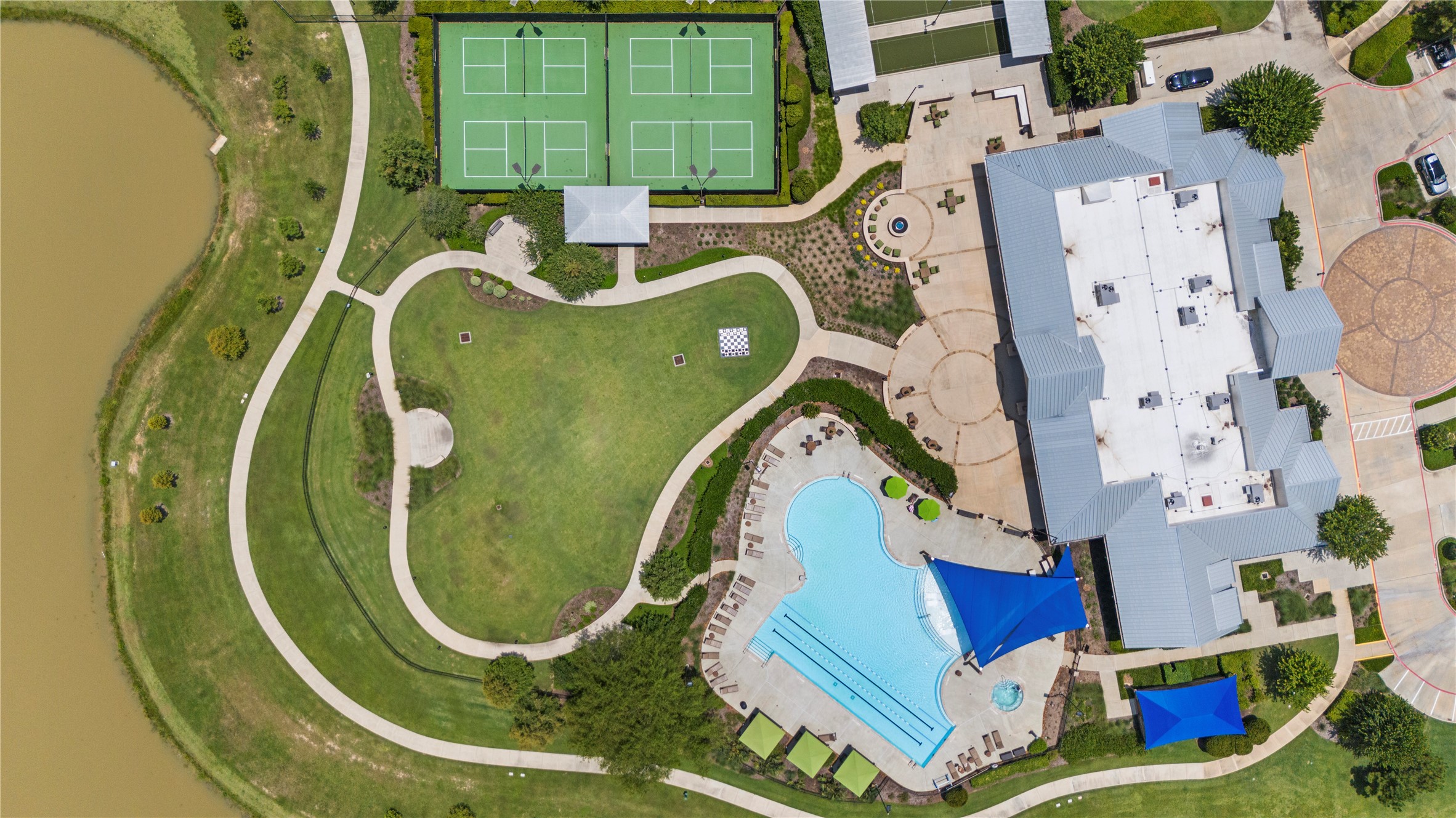 5535 Water Terrace Lane Fulshear, TX 77441 - Photo 37 of 43 an aerial view of a swimming pool