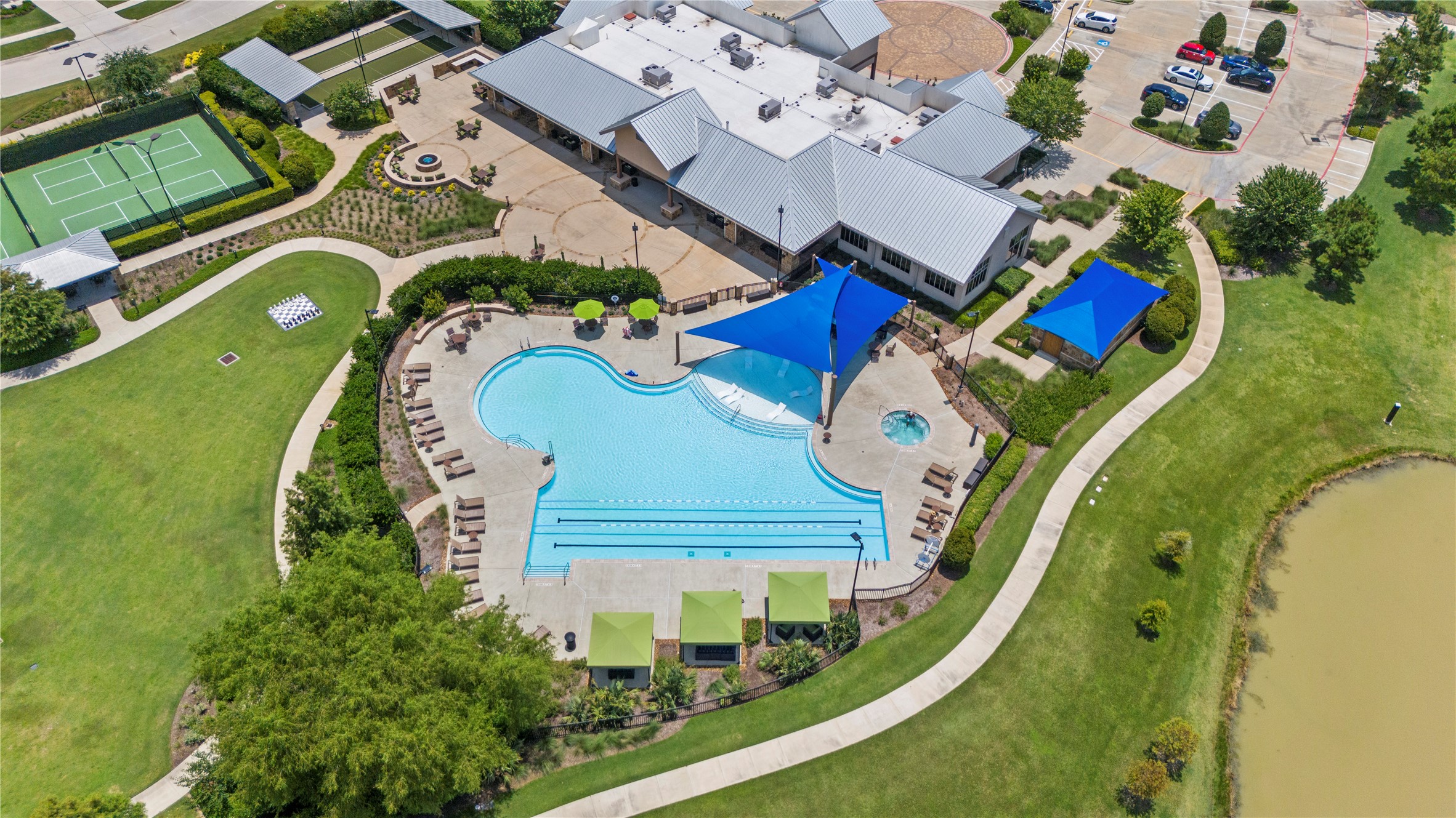 5535 Water Terrace Lane Fulshear, TX 77441 - Photo 42 of 43 an aerial view of a house with a swimming pool