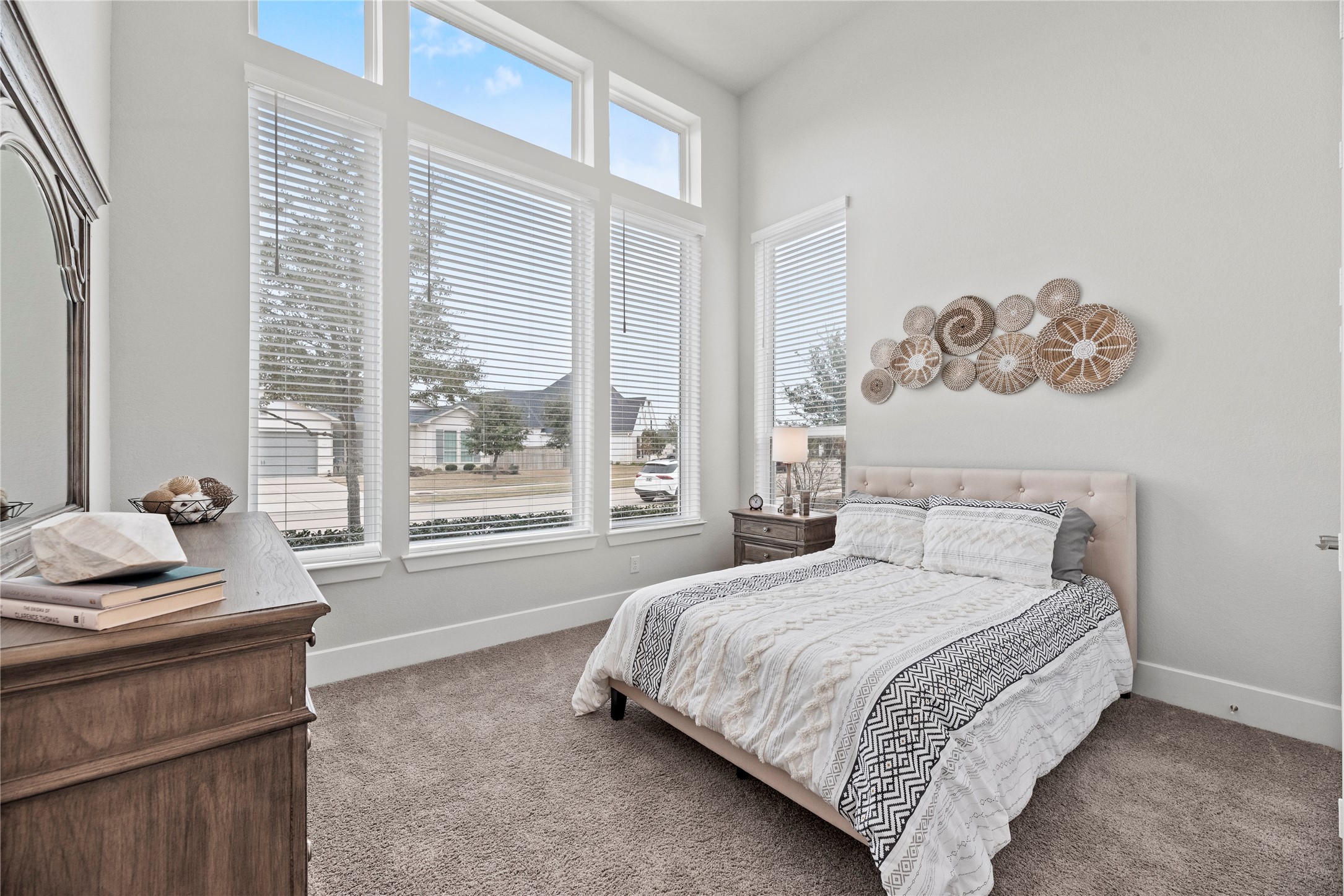 5535 Water Terrace Lane Fulshear, TX 77441 - Photo 10 of 43 a bedroom with a bed and wooden floor