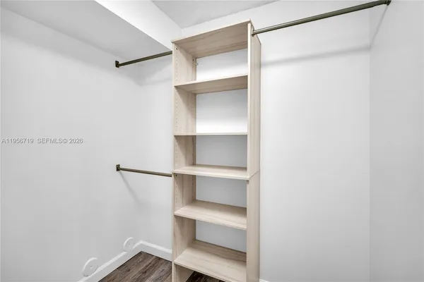a view of an empty walk in closet