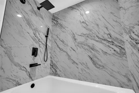 a bathroom with a bathtub
