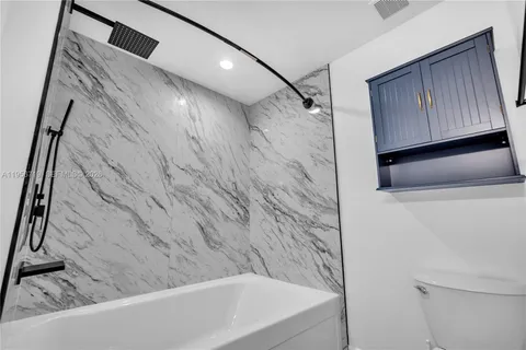 a bathroom with a bathtub