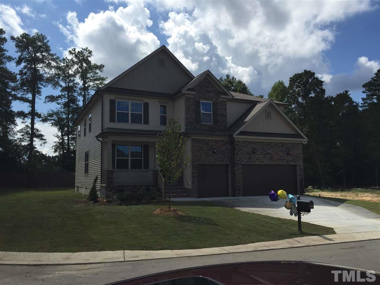 7474 Randshire Way Raleigh, NC 27616 - Photo 1 of 3 a front view of a house with a yard