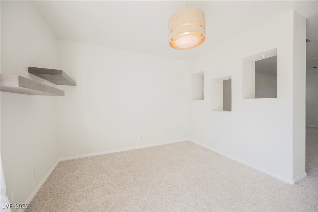 2465 Ping Drive Henderson, NV 89074 - Photo 37 of 91 Sitting area in the Primary bedroom.