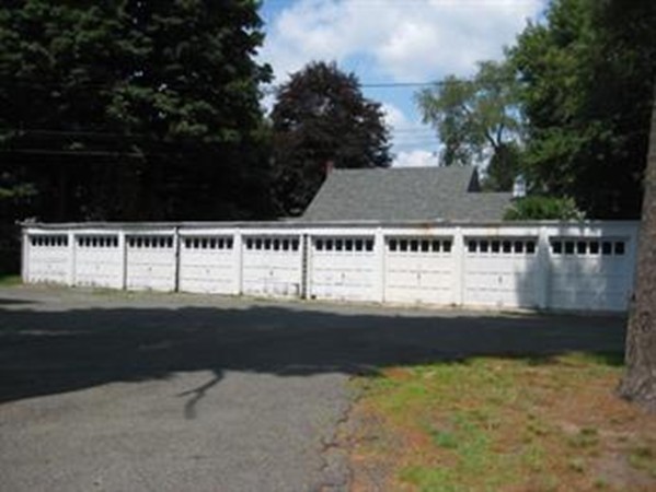 139 Winter Street, Unit 1 Framingham, MA 01702 - Photo 11 of 11 a view of a swimming pool with an outdoor space