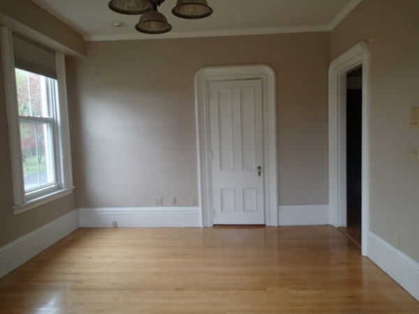 139 Winter Street, Unit 1 Framingham, MA 01702 - Photo 5 of 11 an empty room with window and closet