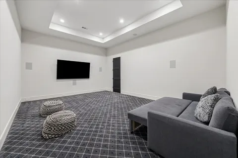 a bedroom with a bed and a desk