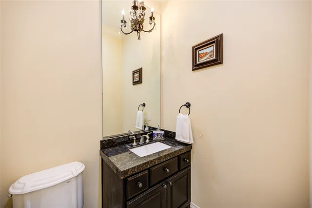 a spacious bedroom with a bed and a large window