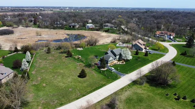 a view of a garden with an outdoor seating