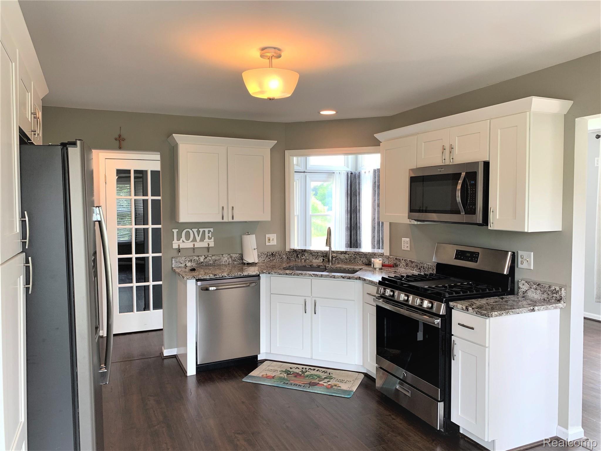 57260 12 Mile Road New Hudson, MI 48165 - Photo 12 of 22 kitchen 2.jpg