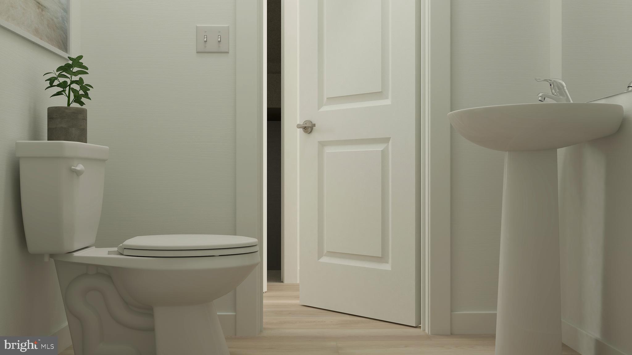 5 Inkwell Lane Sicklerville, NJ 08081 - Photo 4 of 20 a white toilet sitting next to a bathroom sink