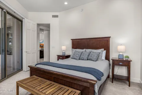 a bed room with furniture and a window