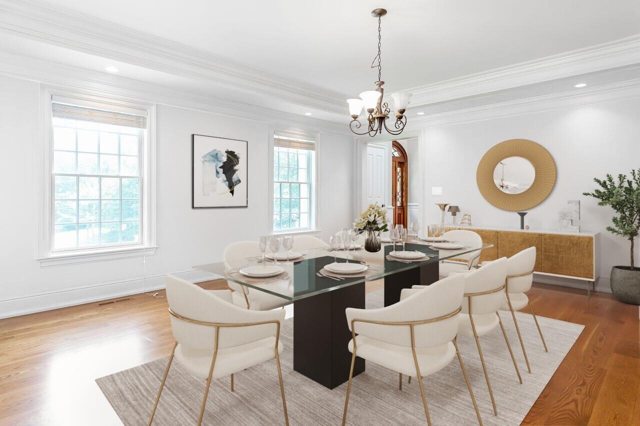 274 Mariomi Road New Canaan, CT 06840 - Photo 19 of 56 a view of a dining room with furniture window and wooden floor
