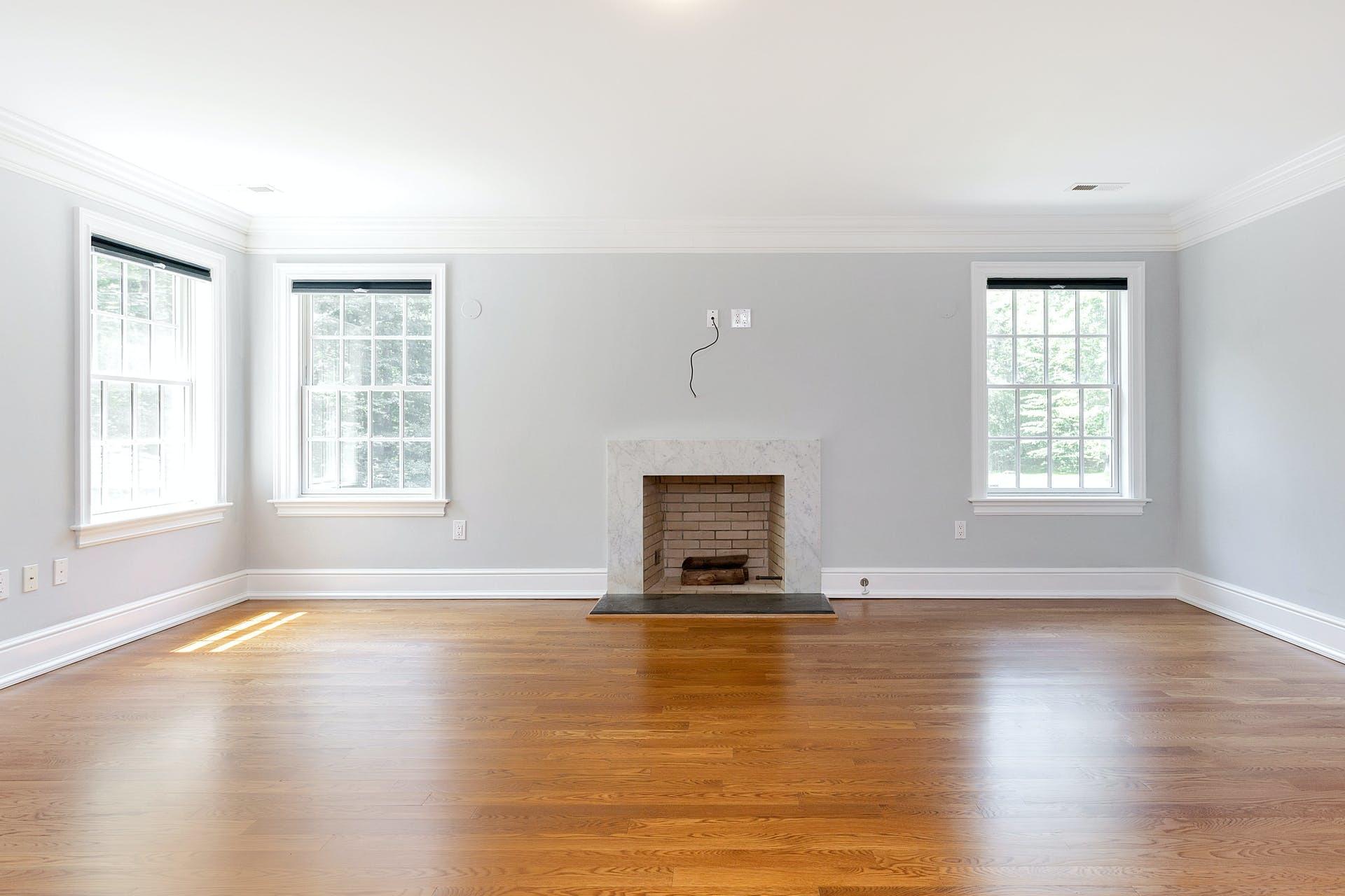 274 Mariomi Road New Canaan, CT 06840 - Photo 27 of 56 a view of an empty room with window and wooden floor