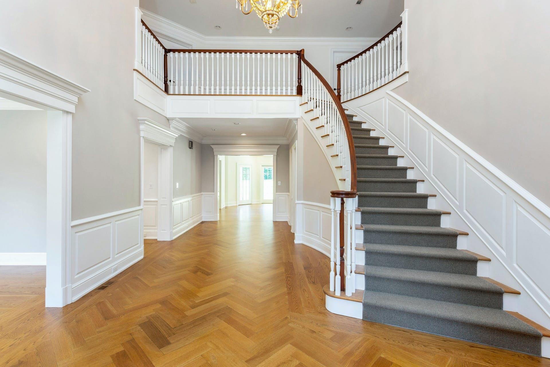 274 Mariomi Road New Canaan, CT 06840 - Photo 4 of 56 a view of entryway and hall with wooden floor