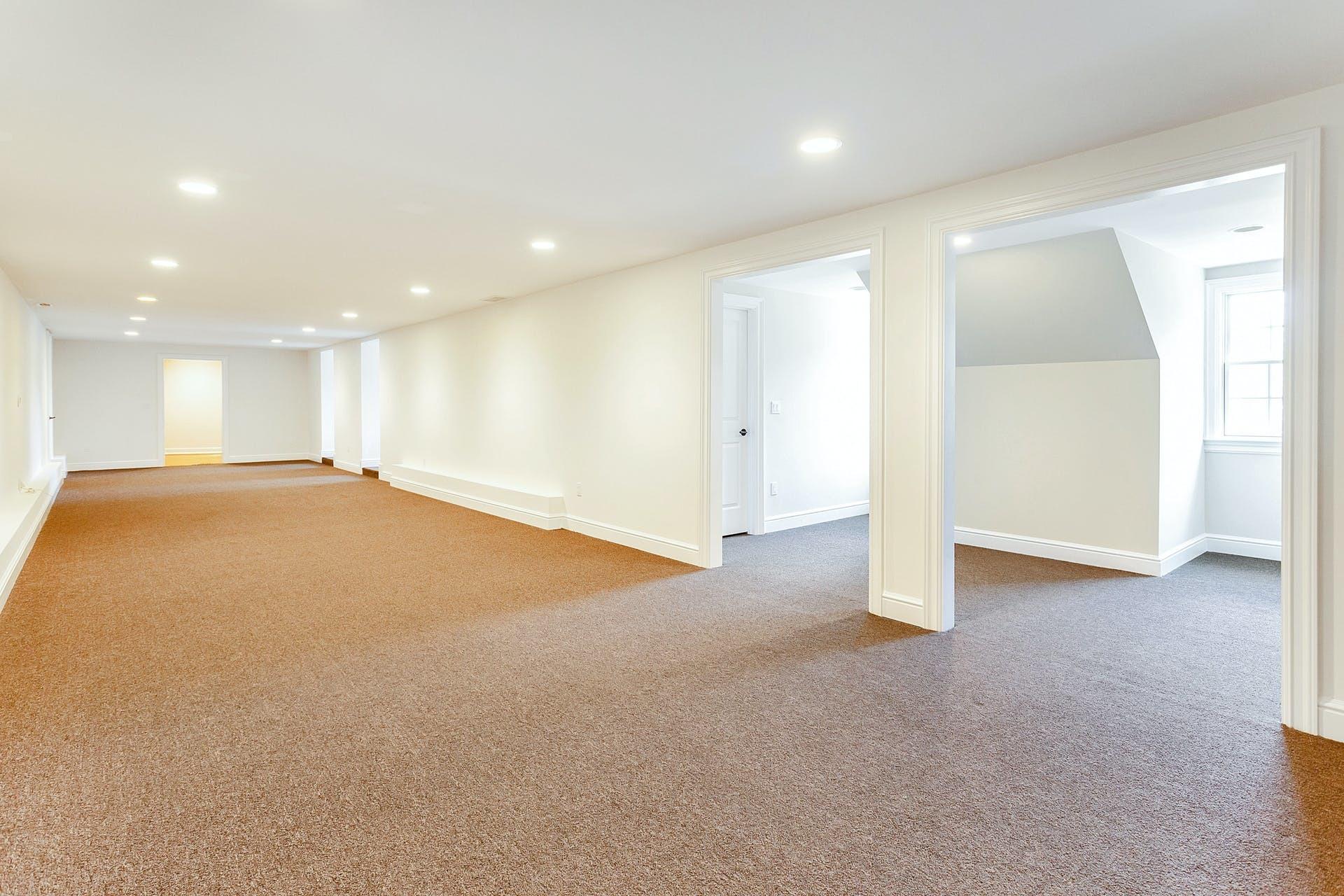 274 Mariomi Road New Canaan, CT 06840 - Photo 46 of 56 a view of an empty room with a kitchen
