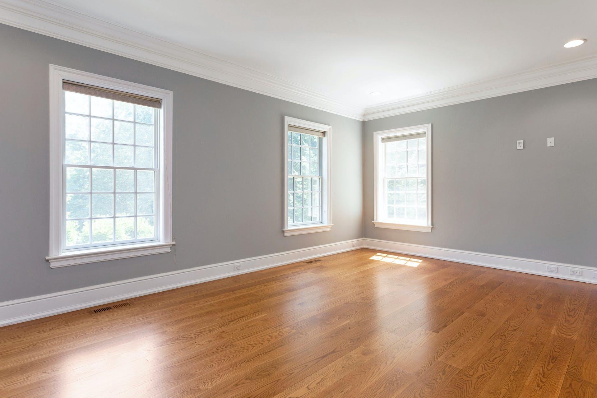 274 Mariomi Road New Canaan, CT 06840 - Photo 5 of 56 an empty room with wooden floor and windows