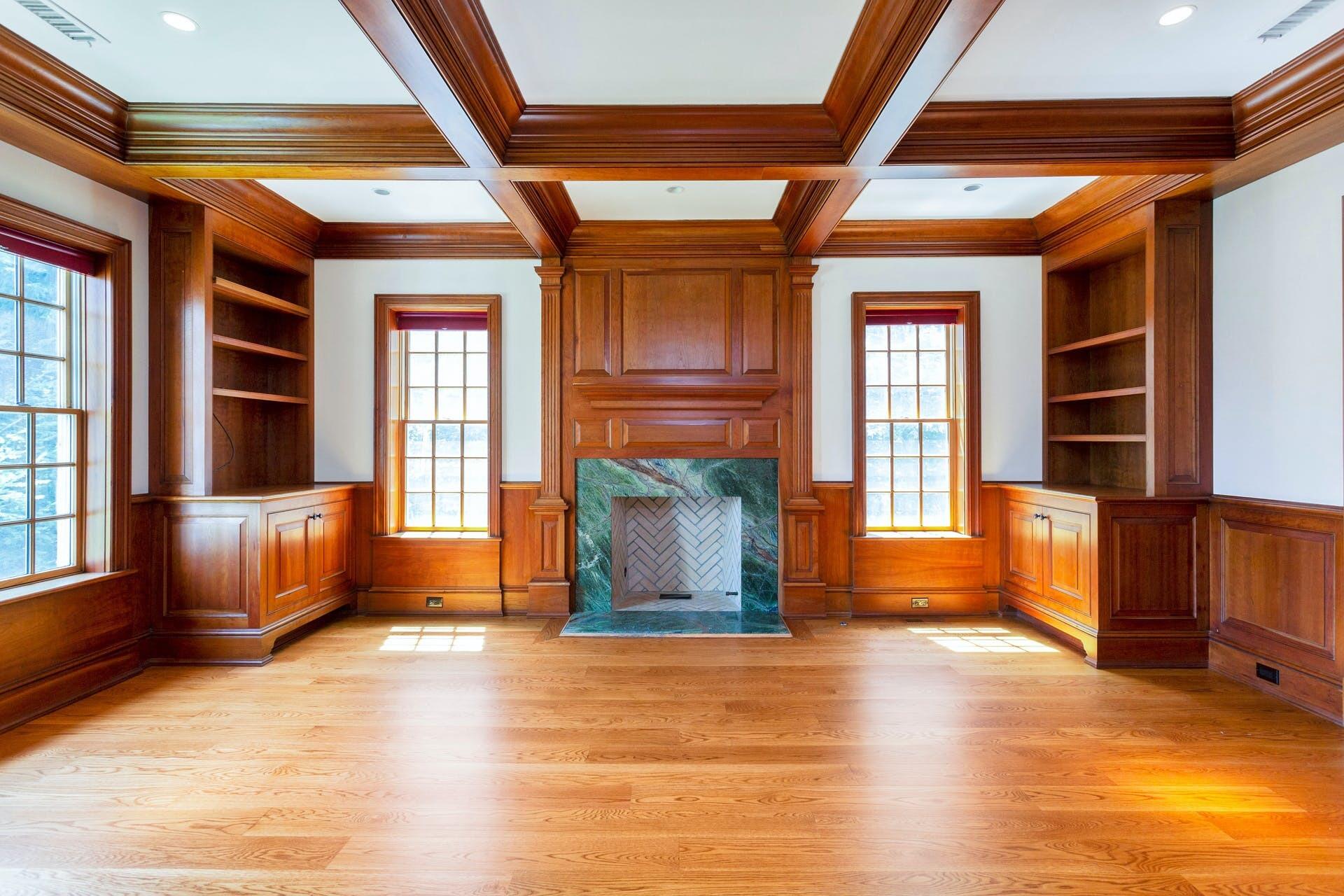 274 Mariomi Road New Canaan, CT 06840 - Photo 6 of 56 a view of a hallway with windows and chandelier