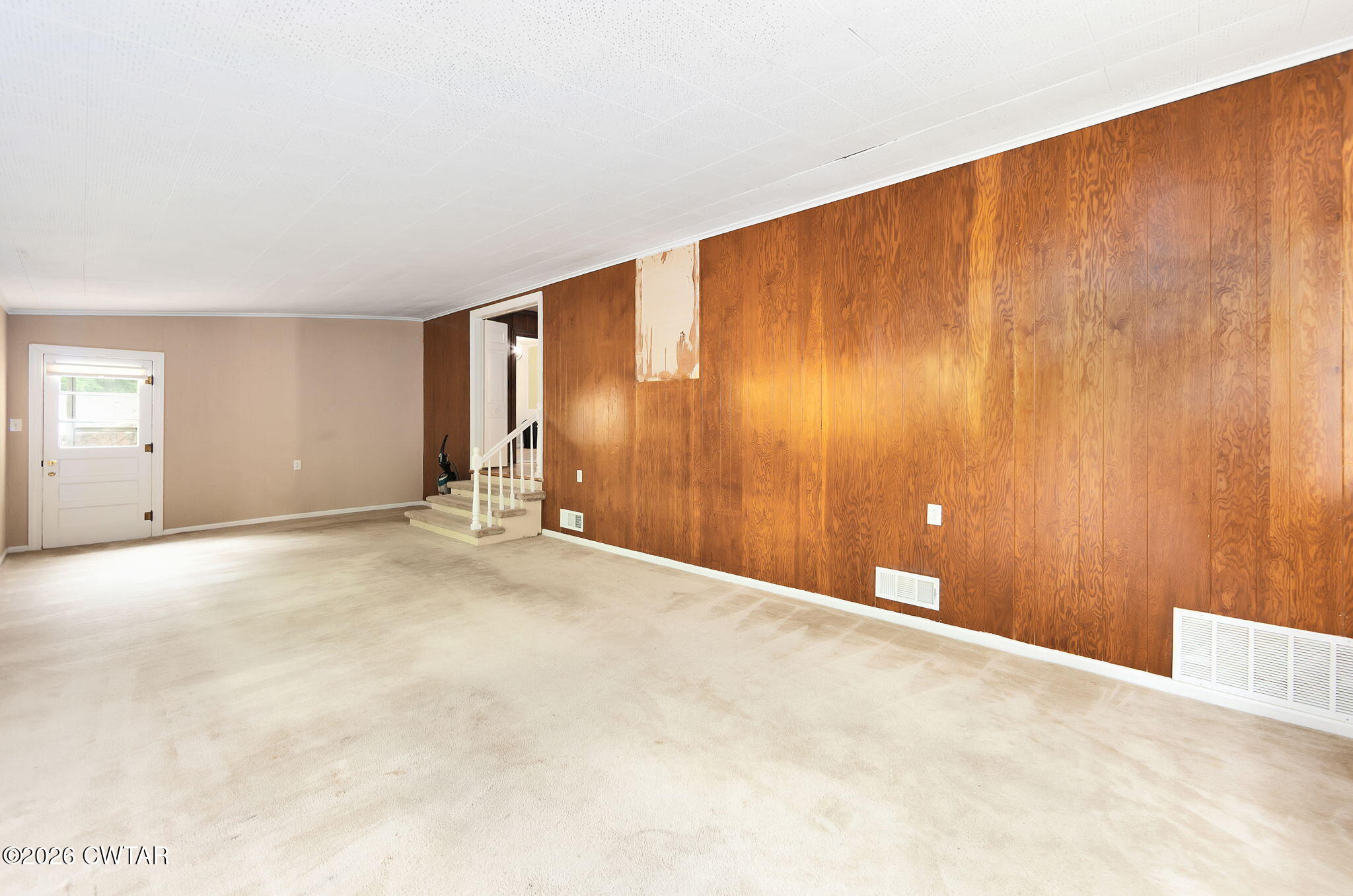 118 Radio Road Jackson, TN 38301 - Photo 5 of 22 a view of an empty room with a window