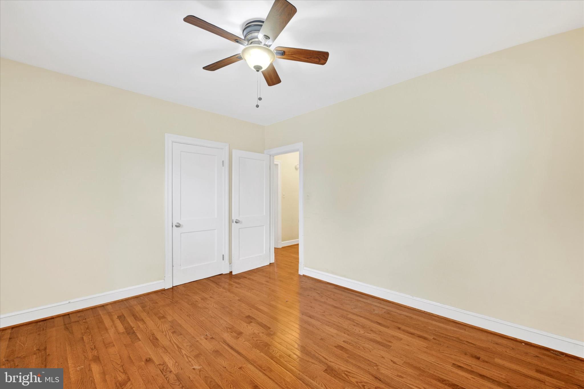 1243-10 Ten Oaks Road Baltimore, MD 21227 - Photo 14 of 28 Bedroom 2 hardwood flooring
