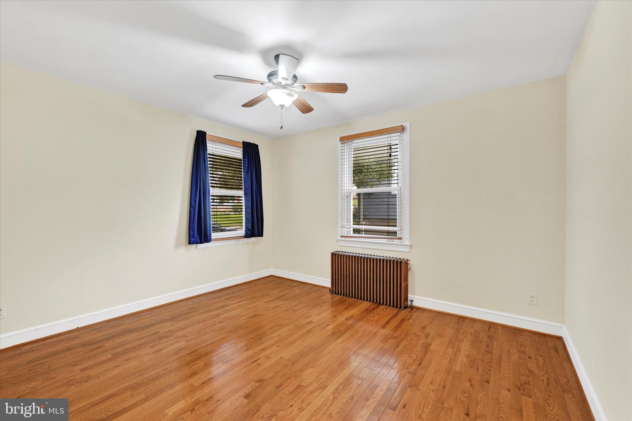 1243-10 Ten Oaks Road Baltimore, MD 21227 - Photo 16 of 28 Bedroom 1 hardwood flooring