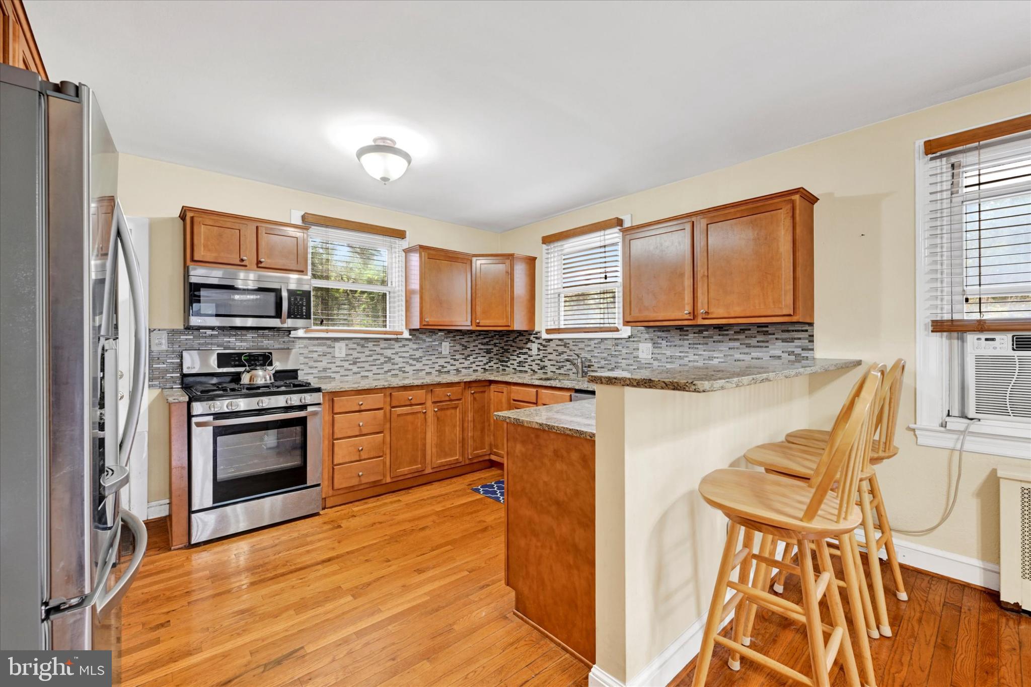 1243-10 Ten Oaks Road Baltimore, MD 21227 - Photo 10 of 28 Kitchen breakfast bar