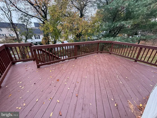 a view of deck with wooden floor and outdoor seating