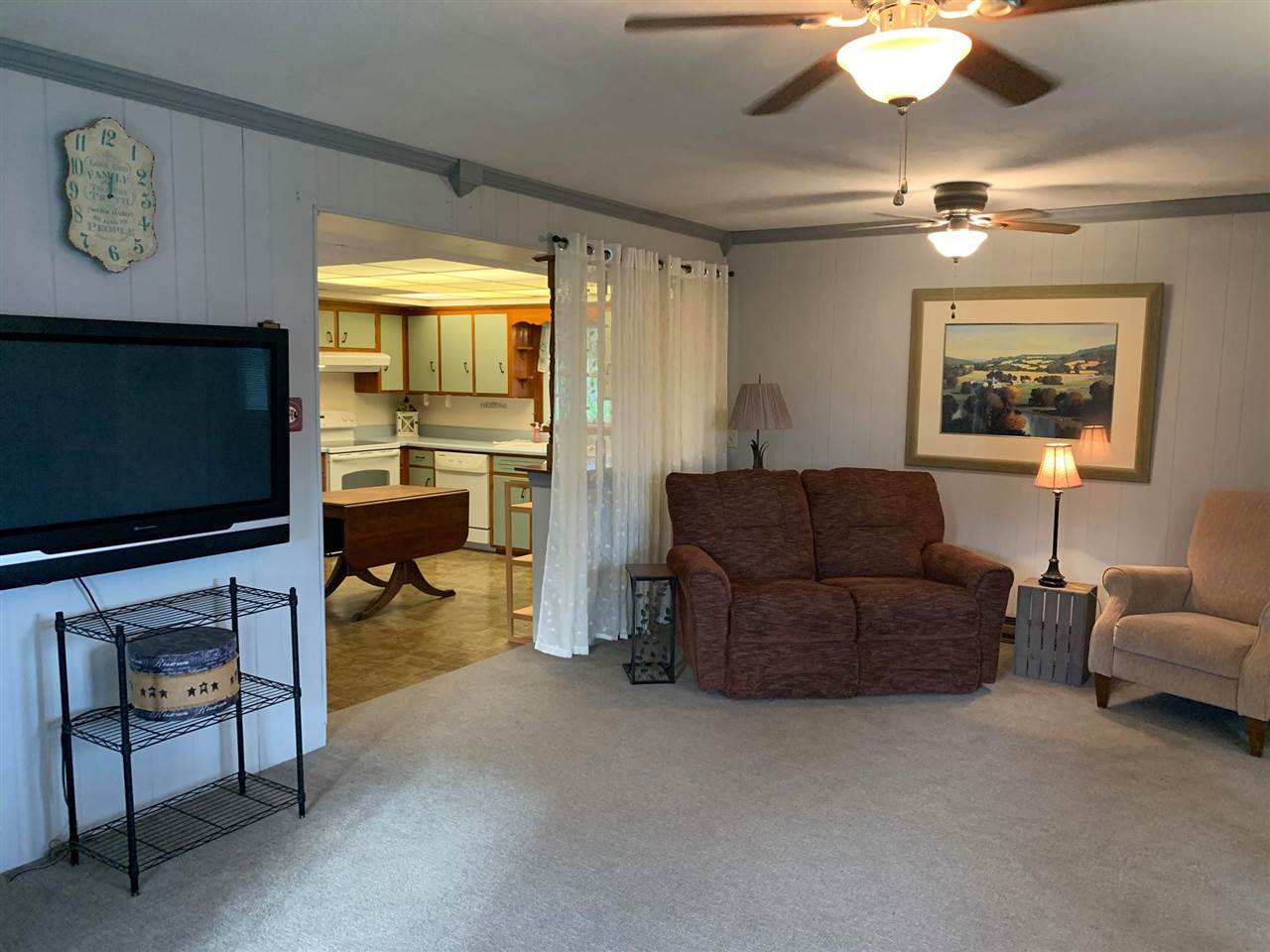 1504 Old Providence Road Raphine, VA 24472 - Photo 13 of 37 a living room with furniture and a flat screen tv