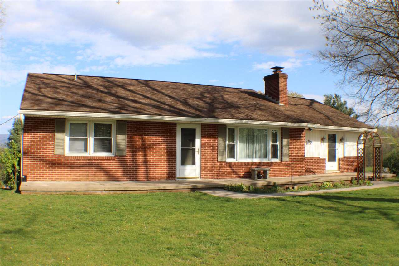 1504 Old Providence Road Raphine, VA 24472 - Photo 2 of 37 a front view of a house with garden