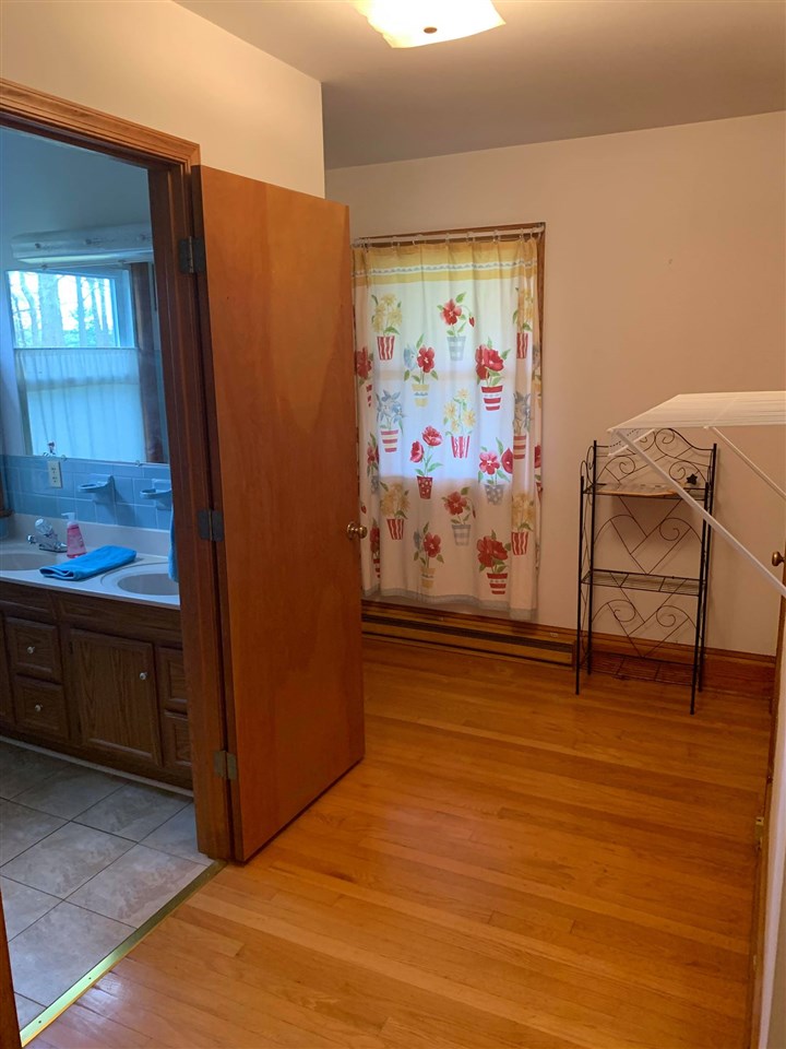 1504 Old Providence Road Raphine, VA 24472 - Photo 25 of 37 a view of room with window and wooden floor