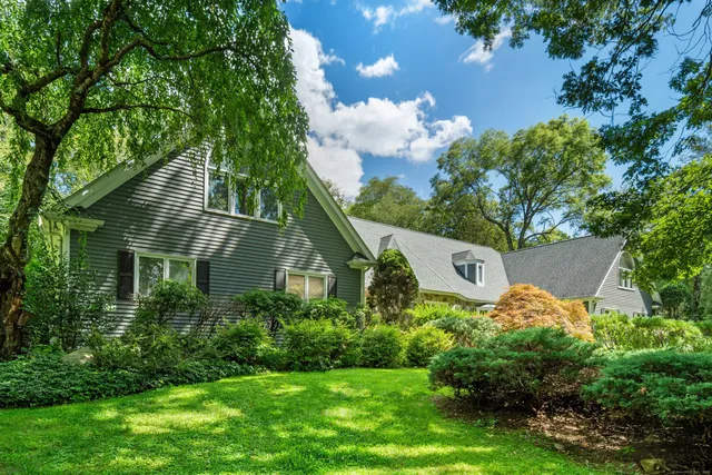 a backyard of a house with lots of green space