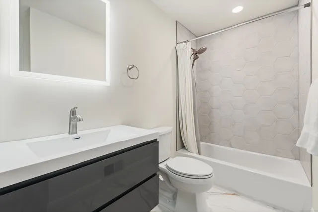 a bed room with a bed and a fireplace