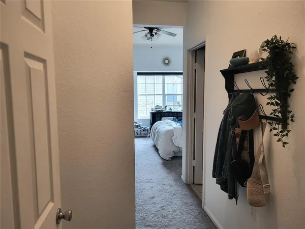a bedroom with two beds and a window