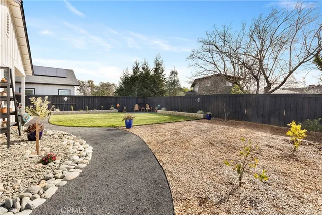 a view of a swimming pool with a bench