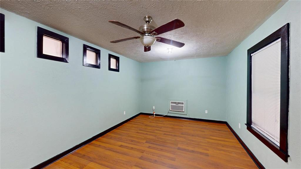 5817 Sandra Drive Fort Worth, TX 76133 - Photo 19 of 26 a view of empty room with wooden floor