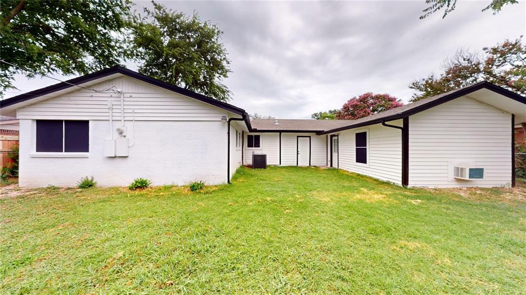 5817 Sandra Drive Fort Worth, TX 76133 - Photo 24 of 26 a view of an house with backyard space and garden