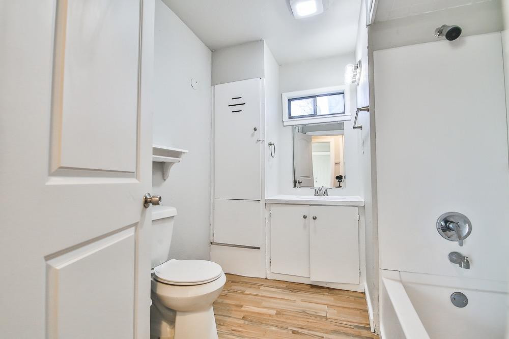 5705 County Road 1200 Lubbock, TX 79407 - Photo 15 of 29 a bathroom with a sink a toilet and shower