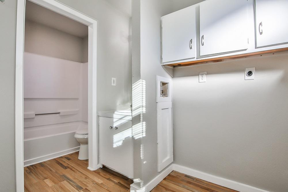 5705 County Road 1200 Lubbock, TX 79407 - Photo 19 of 29 a view of walk in closet with empty racks