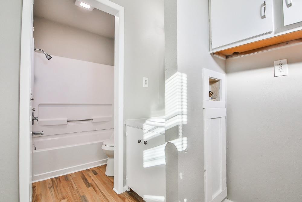 5705 County Road 1200 Lubbock, TX 79407 - Photo 21 of 29 a view of walk in closet with empty racks