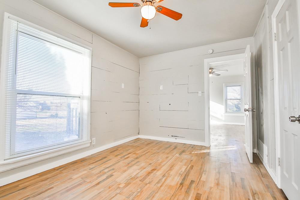 5705 County Road 1200 Lubbock, TX 79407 - Photo 28 of 29 a view of empty room with wooden floor