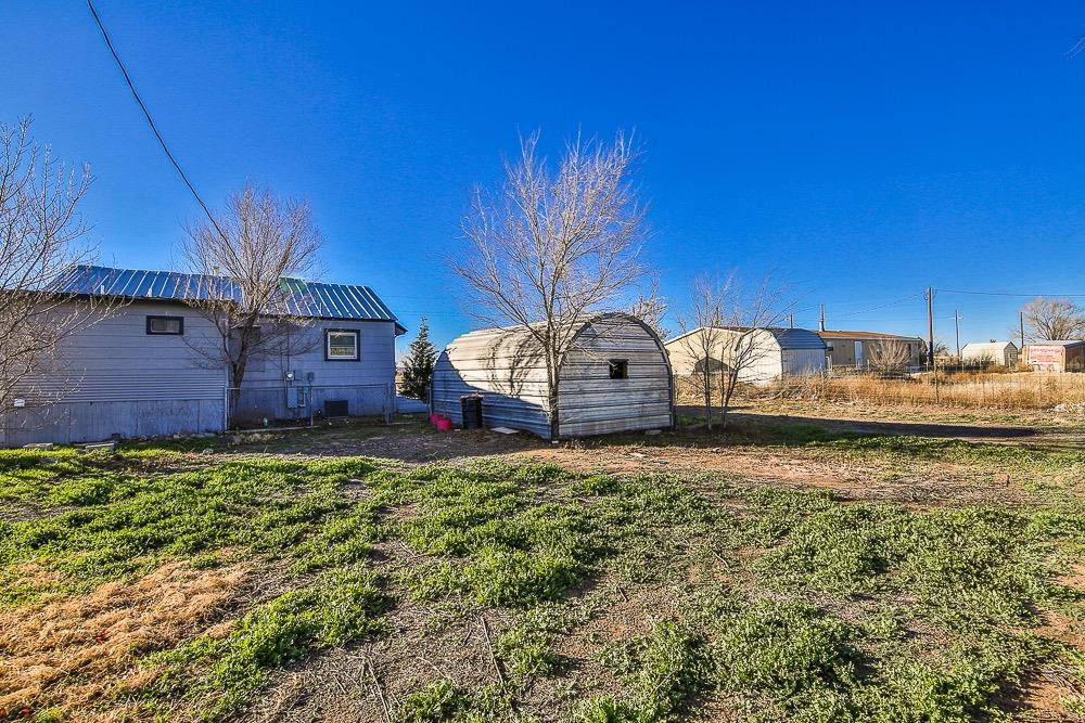5705 County Road 1200 Lubbock, TX 79407 - Photo 5 of 29 a house view with a garden space