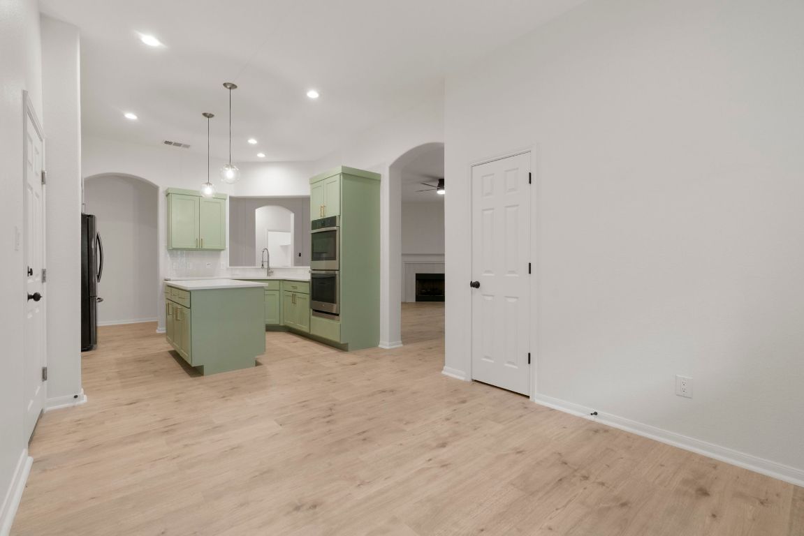1333 Clary Sage Loop Round Rock, TX 78665 - Photo 13 of 35 a view of kitchen with refrigerator and window
