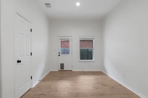 an empty room with windows