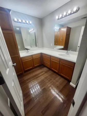 a bathroom with sink and mirror