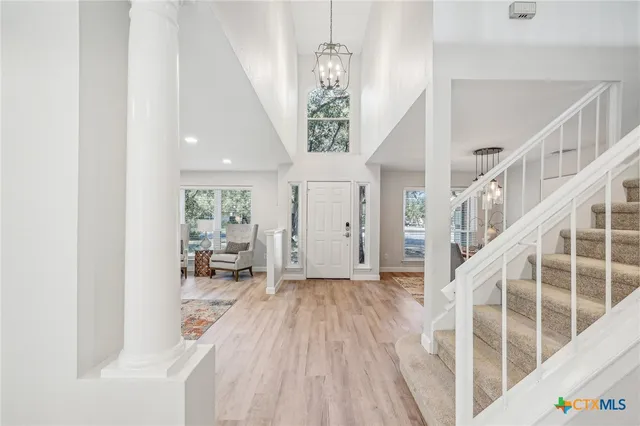 a view of entryway with livingroom and furniture